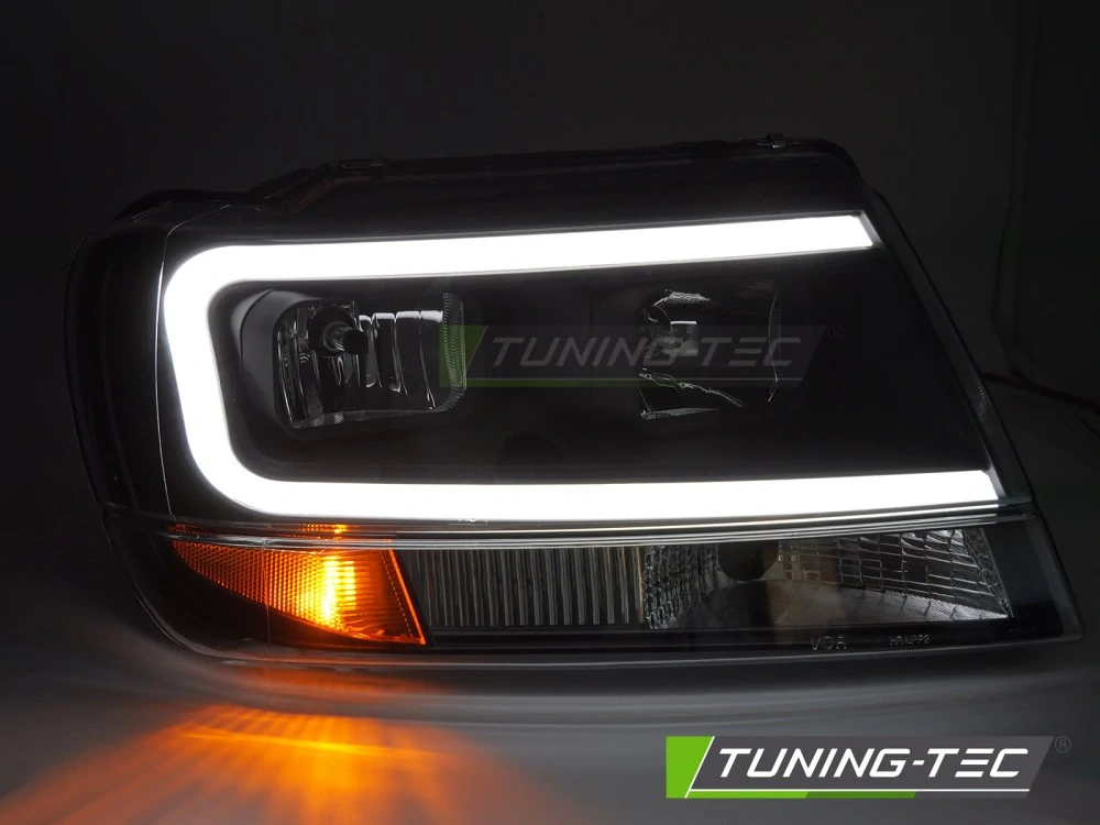 Přední světla, lampy, světlomety Chrysler Jeep Grand Cherokee 99-05.05 černé TUBE LIGHT